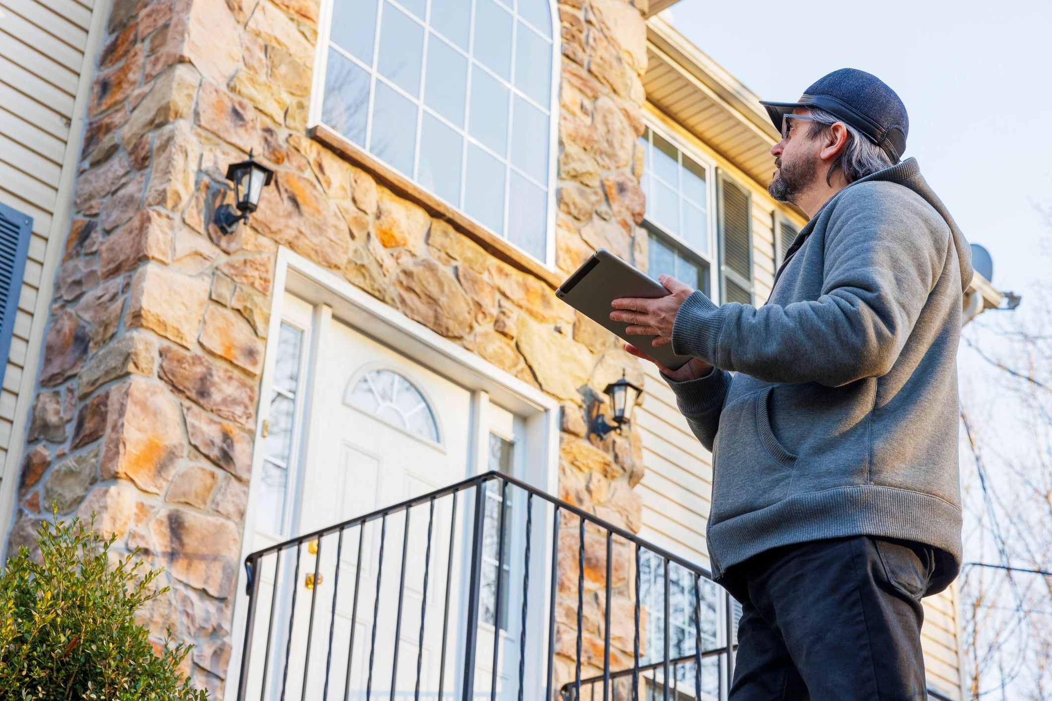 House inspector reviewing a home's exterior